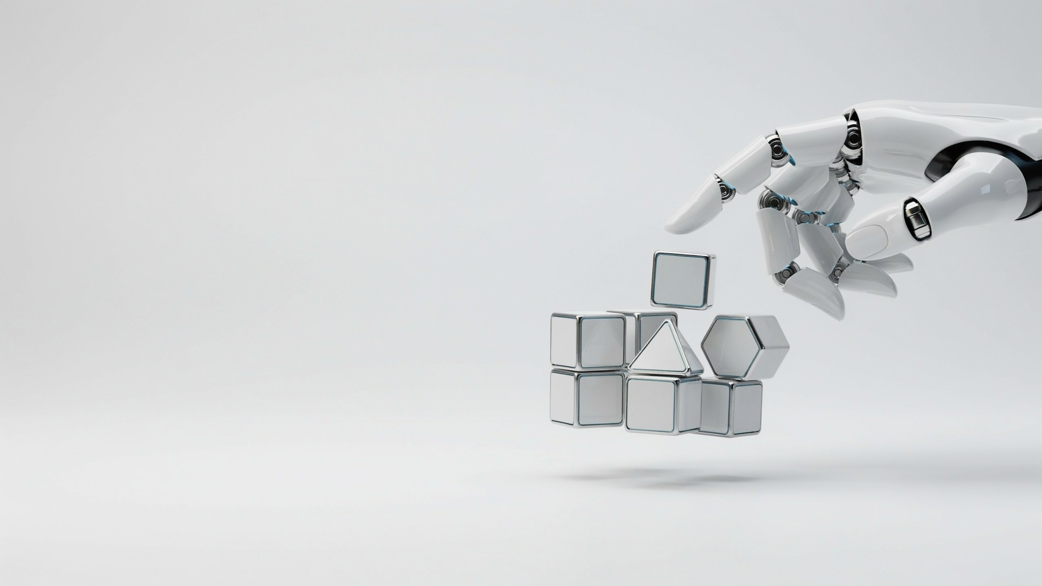 Robotic hand assembling geometric building blocks — creative bootcamp workshops
