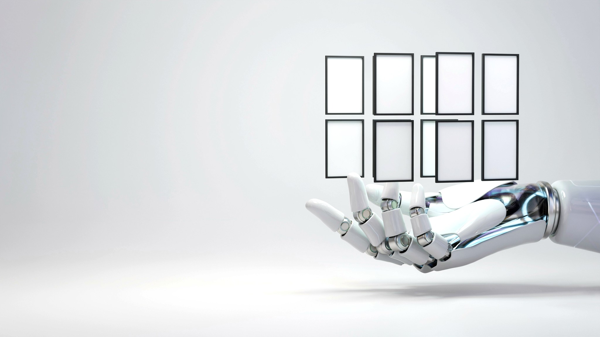 Robotic hand presenting a gallery grid of framed work — IN·DETAIL portfolio and case studies