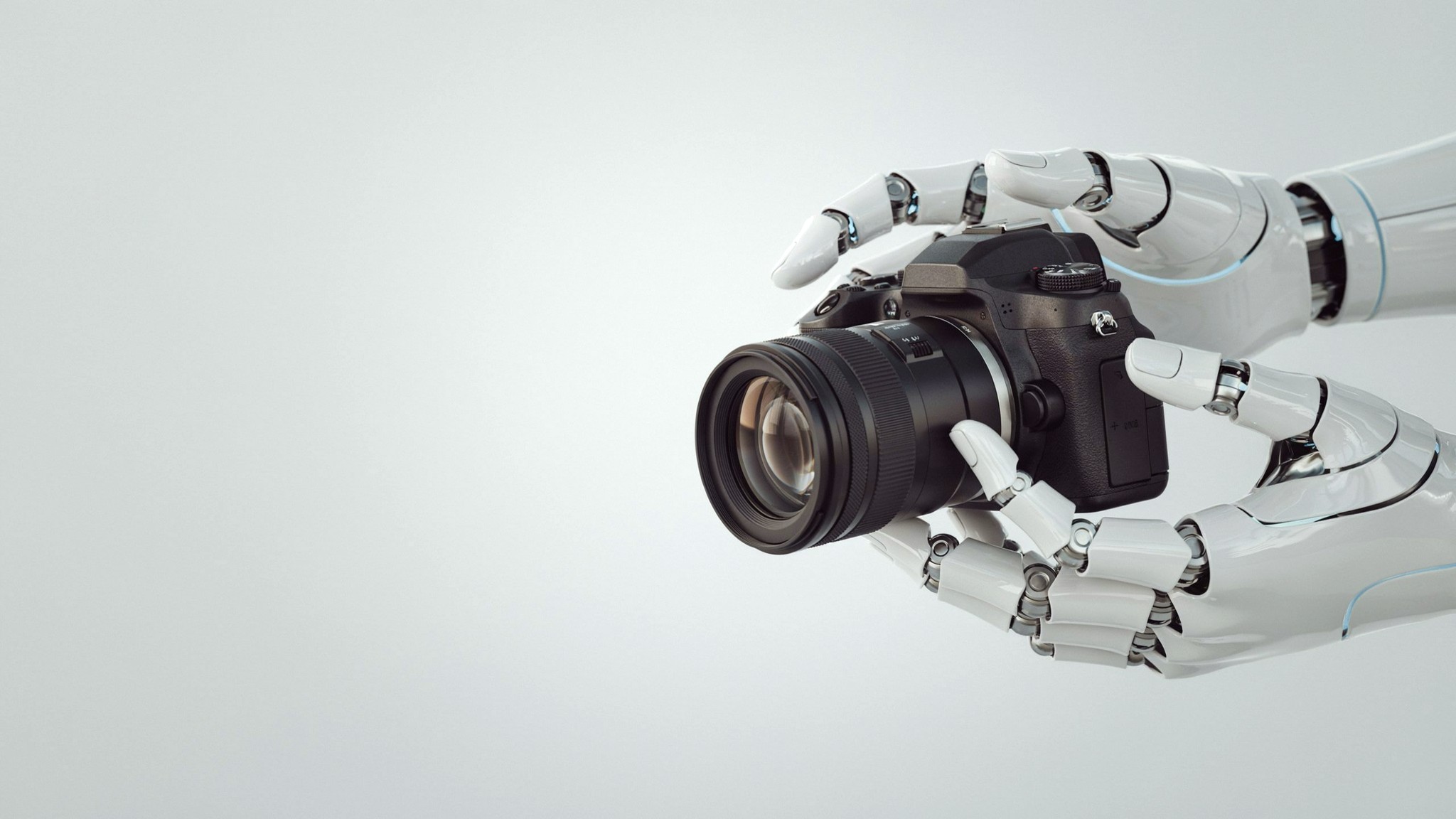 Robotic hands holding a professional camera — brand photography, Johannesburg